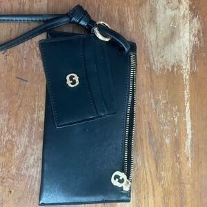 Chic Black Wristlet with Gold Details